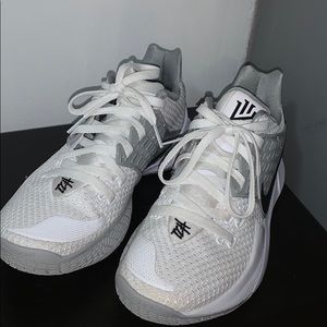 I am selling white and grey Nike basketball shoes